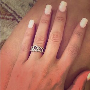 Tiffany & co silver three hearted ring.